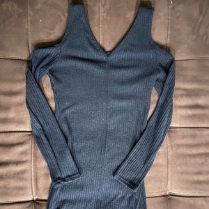 Deep blue shoulder showing form fitting mini dress